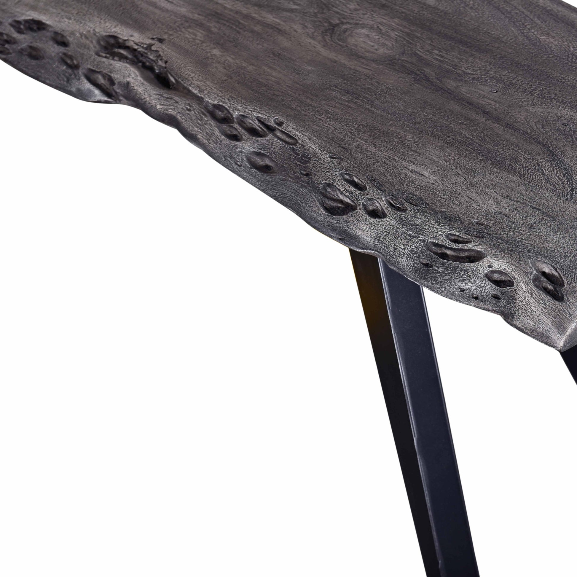 Dark grey live edge wood slab table with distressed finish and black metal legs