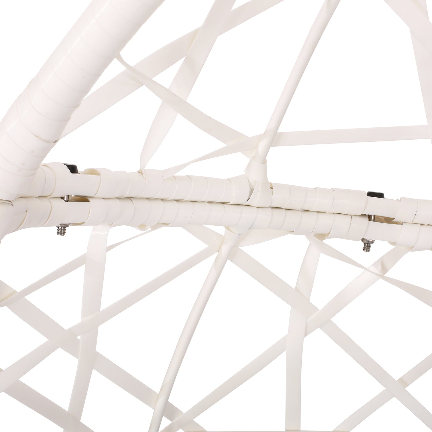 Closeup of white rattan weaving on a modern outdoor chair with metal fasteners