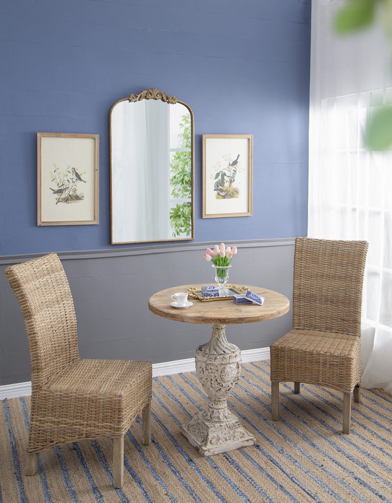 Woven rattan dining chair with natural finish and light wood legs