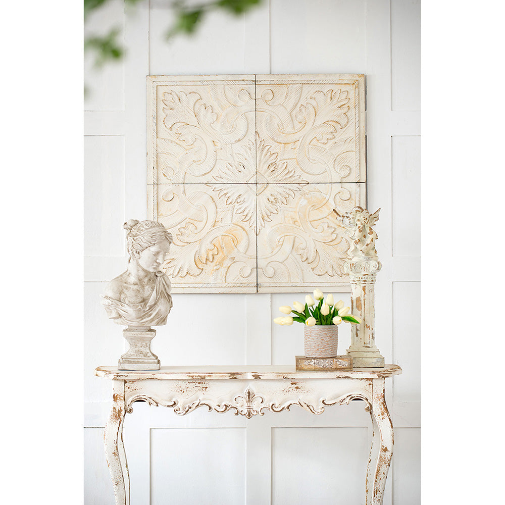 Antique carved wood wall panel featuring ornate scrollwork design in antique white finish