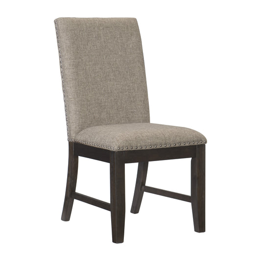 Upholstered dining chair in a neutral textured fabric with silver nailhead trim and dark wood legs