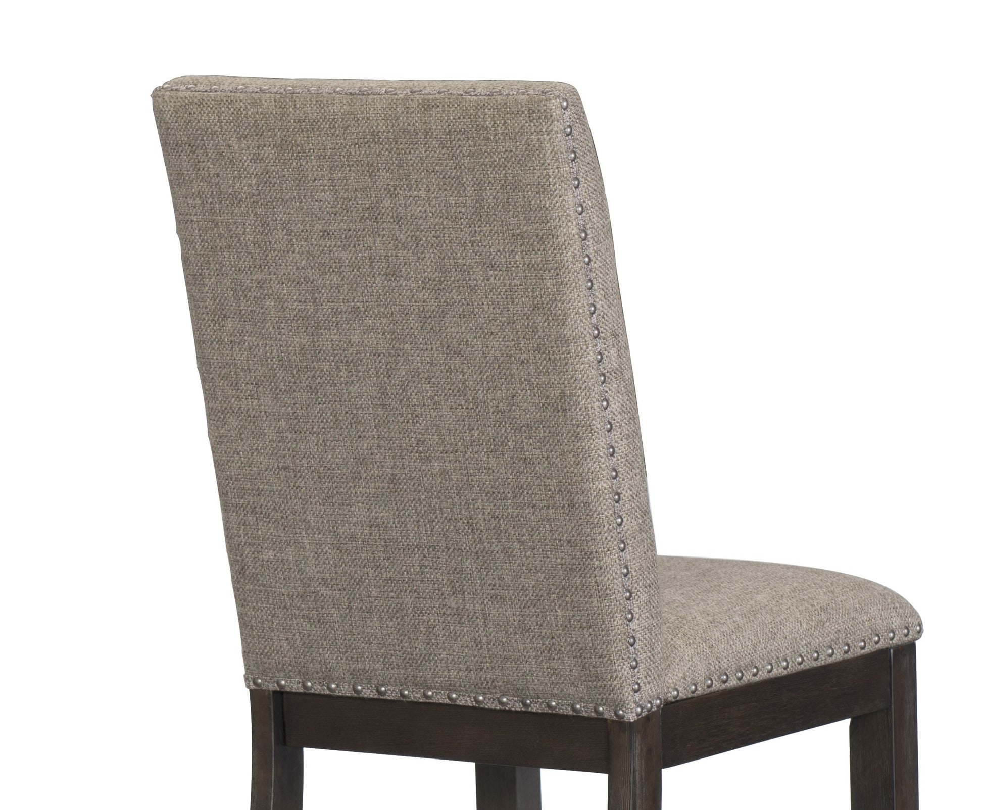 Upholstered dining chair with tufted back and nailhead trim