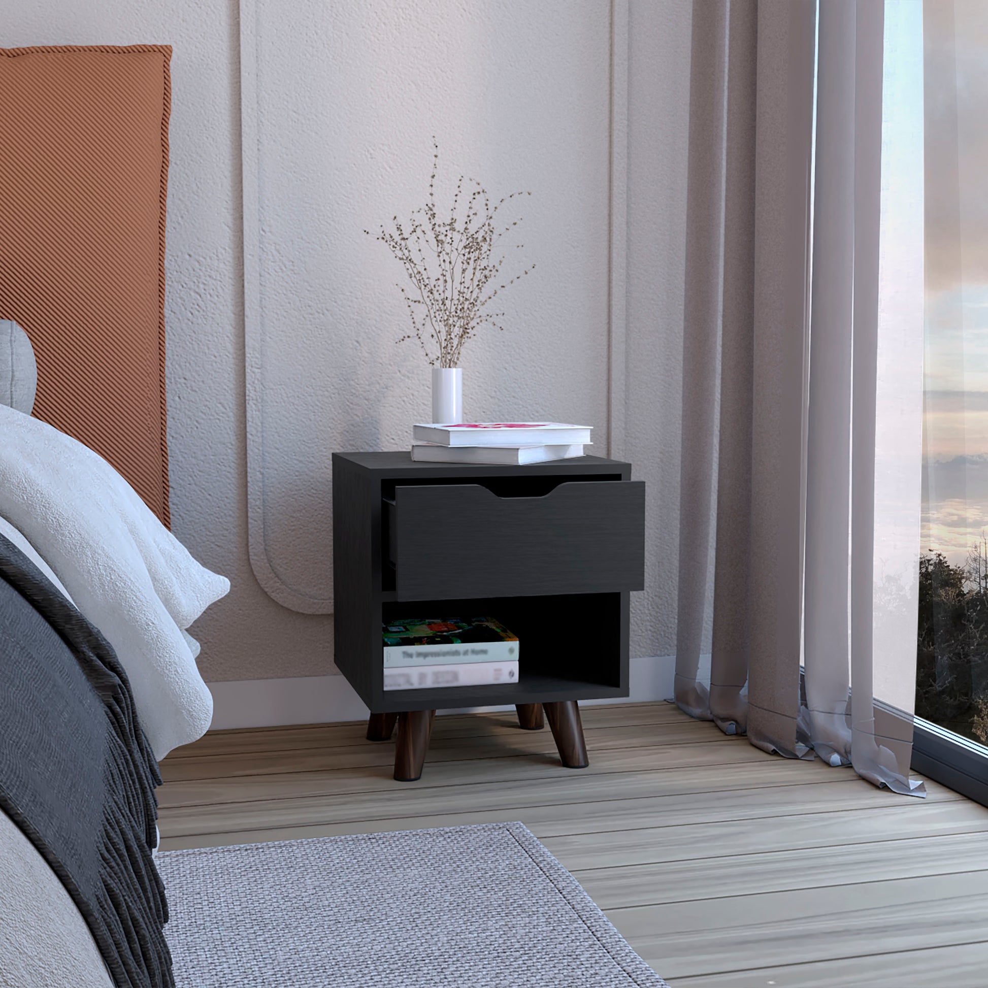 Dark grey modern nightstand with tapered wooden legs and open shelf
