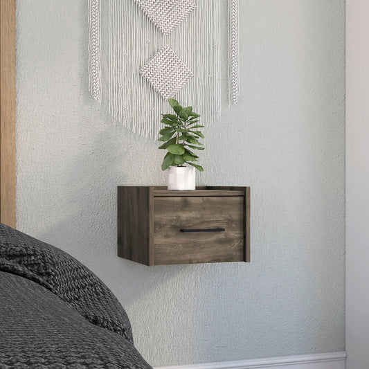 Floating bedside table in distressed wood finish with black handle and drawer