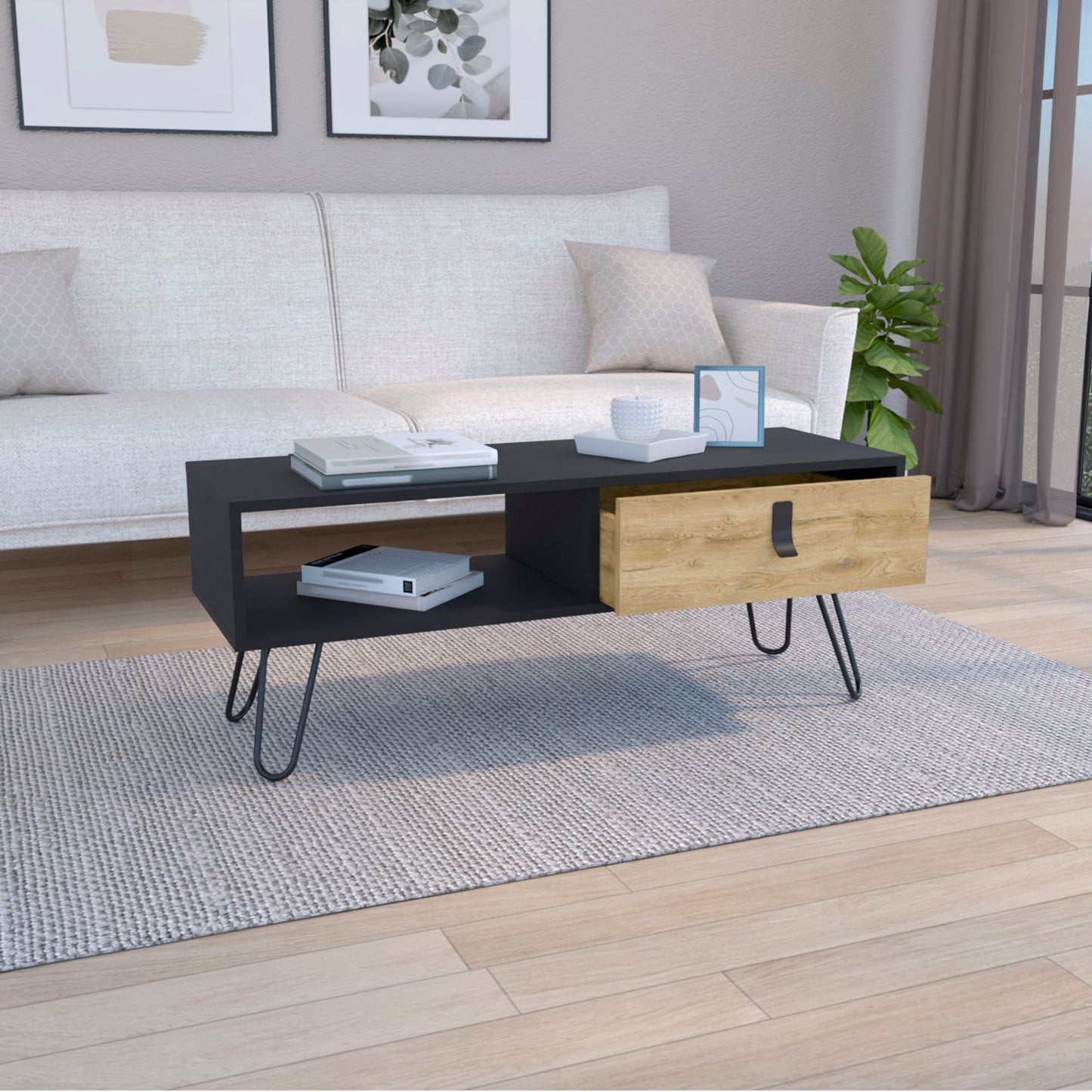 Modern black coffee table with blonde wood drawer and hairpin legs