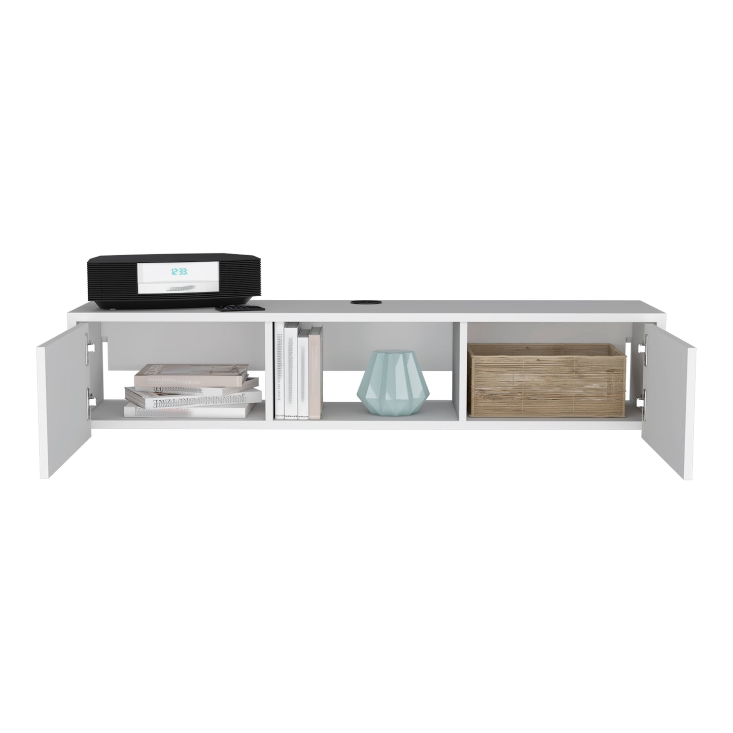 White wallmounted media console with open shelves and a blue vase