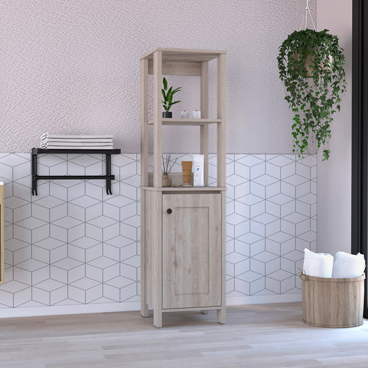 Tall oak bathroom storage tower with one cabinet and three open shelves holding bath essentials
