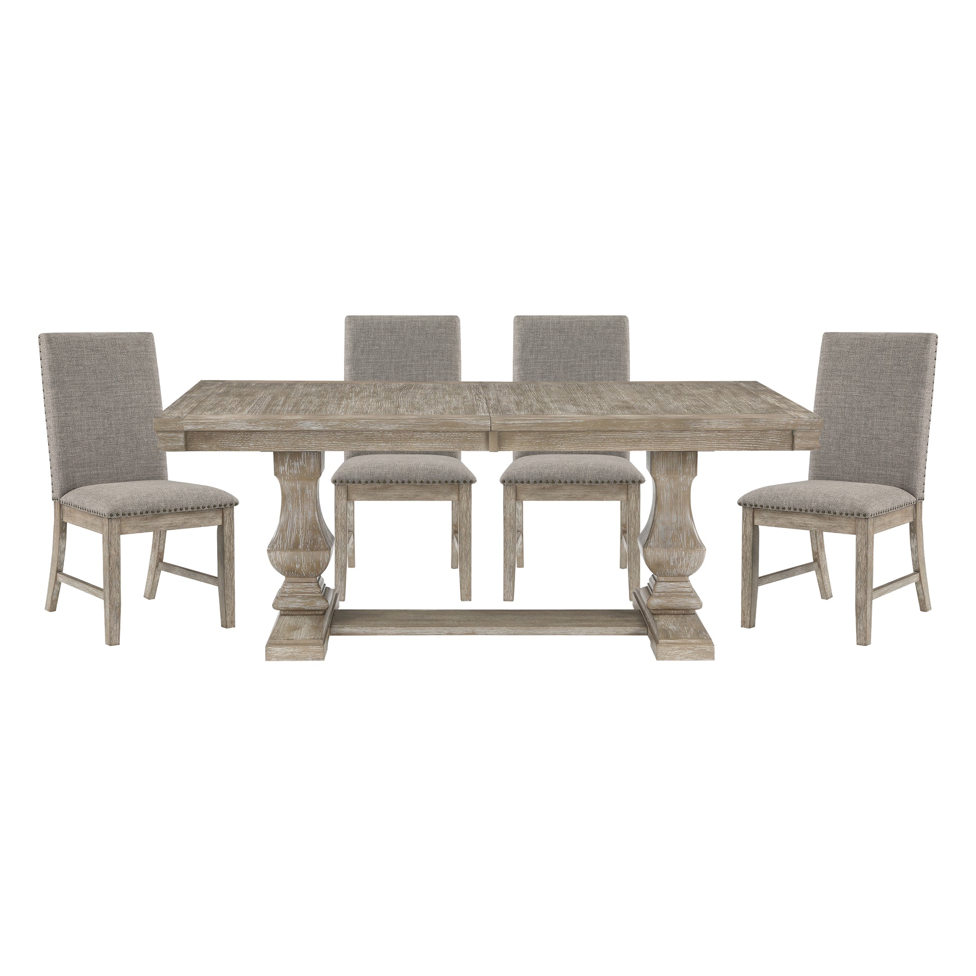 Rustic farmhouse dining table with four upholstered chairs and nailhead trim