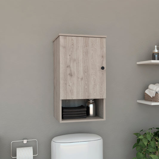 Light oak wood bathroom cabinet with one door and open shelf for storage