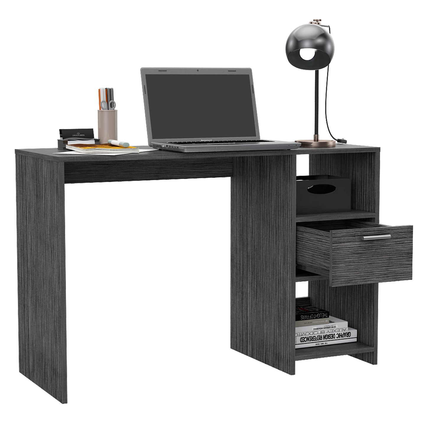 Dark gray laminate writing desk with open shelves and a drawer holding a laptop and desk lamp