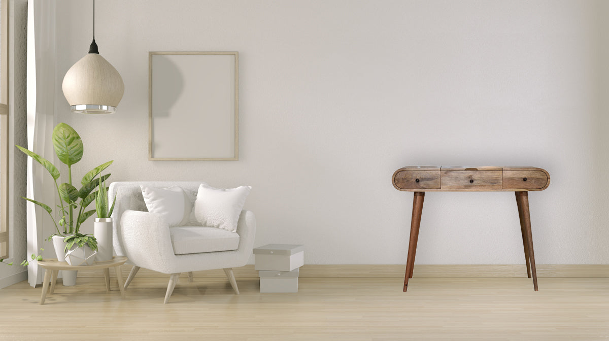 White upholstered armchair with plush pillows