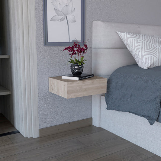 Floating bedside table in light wood grain finish with modern drawer