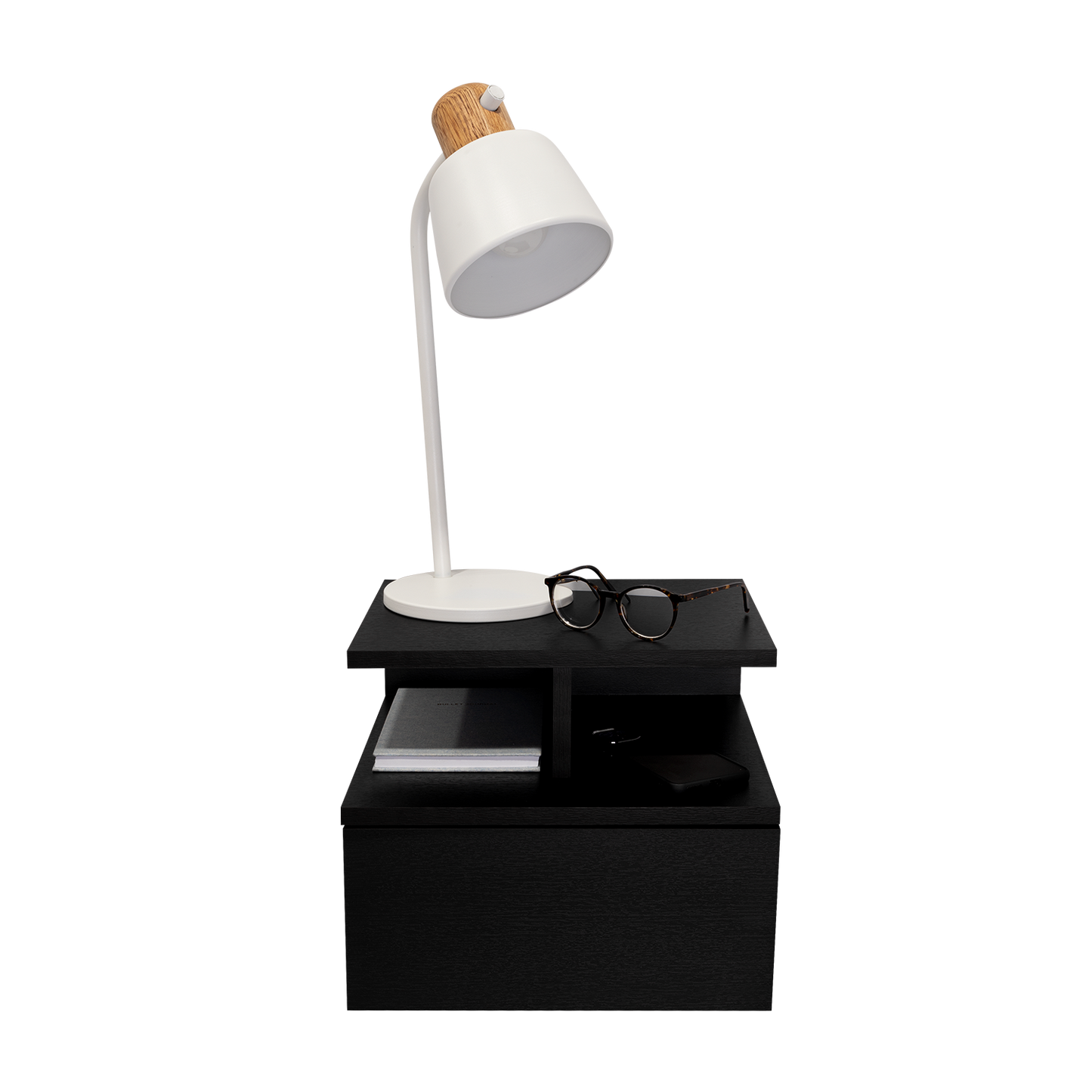 Modern white desk lamp with wooden accent on a black nightstand with glasses
