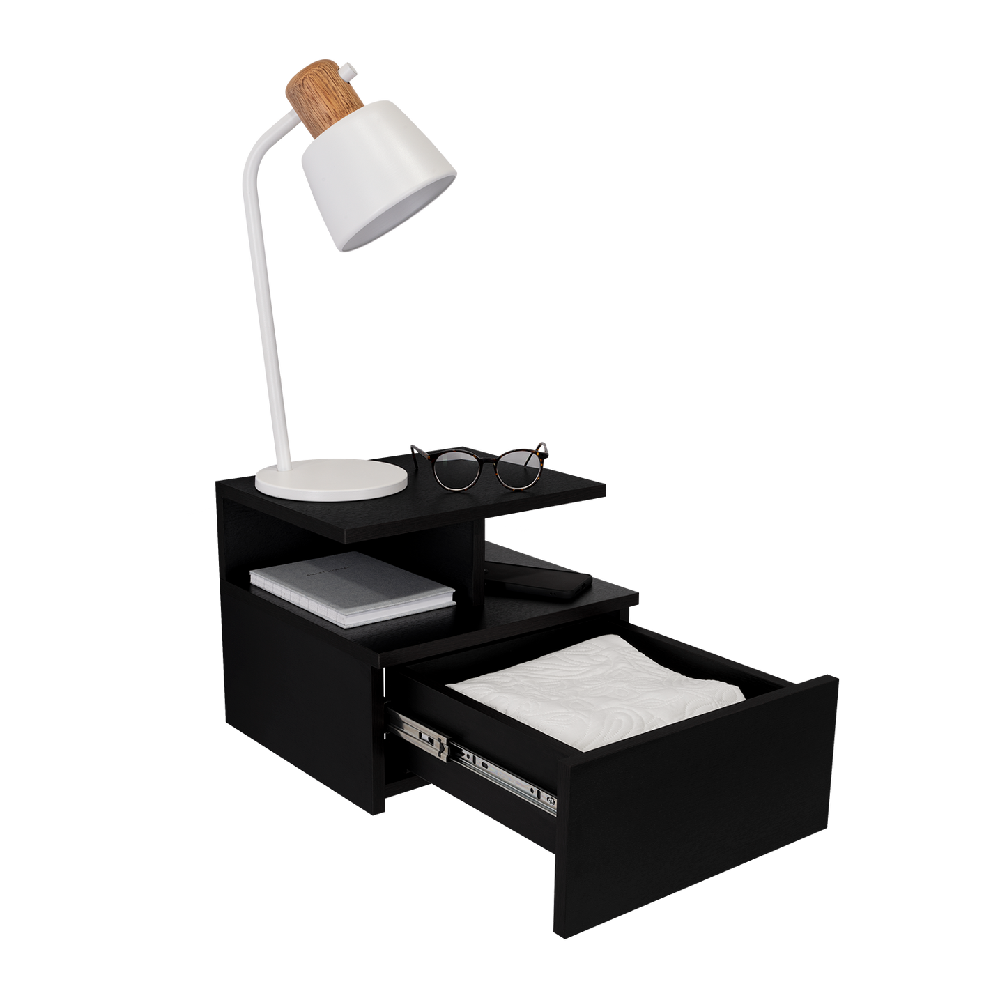 Modern black floating nightstand with open shelves and a drawer holding paper napkins