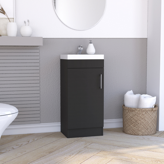 Charcoal grey vanity unit with white countertop and chrome handle ideal for small bathrooms