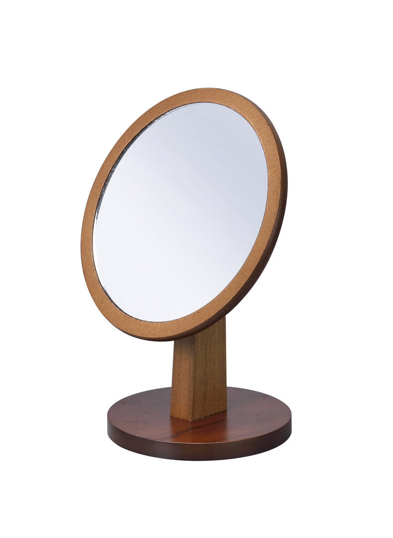 Wooden tabletop vanity mirror with a round reflective surface