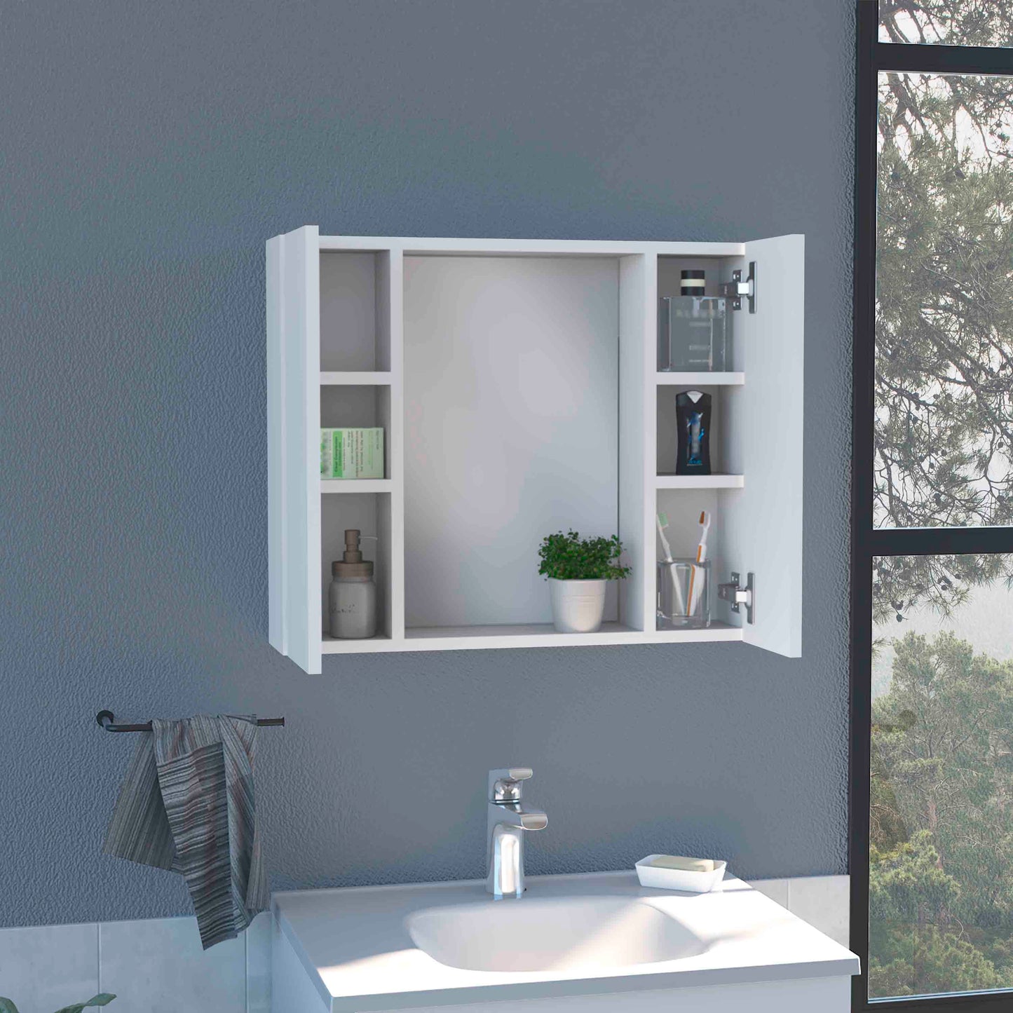 White mirrored medicine cabinet with open doors displaying toiletries and plant
