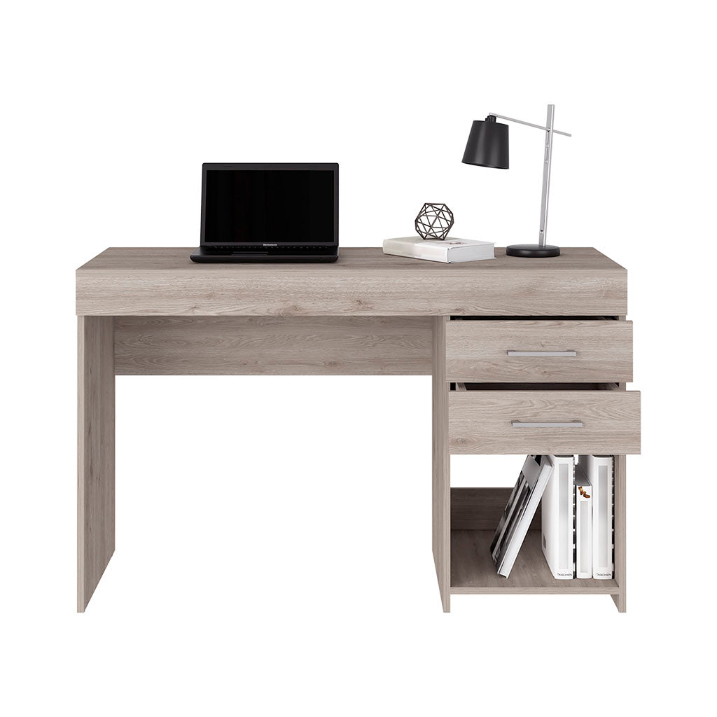 Modern wooden writing desk with two drawers laptop and lamp