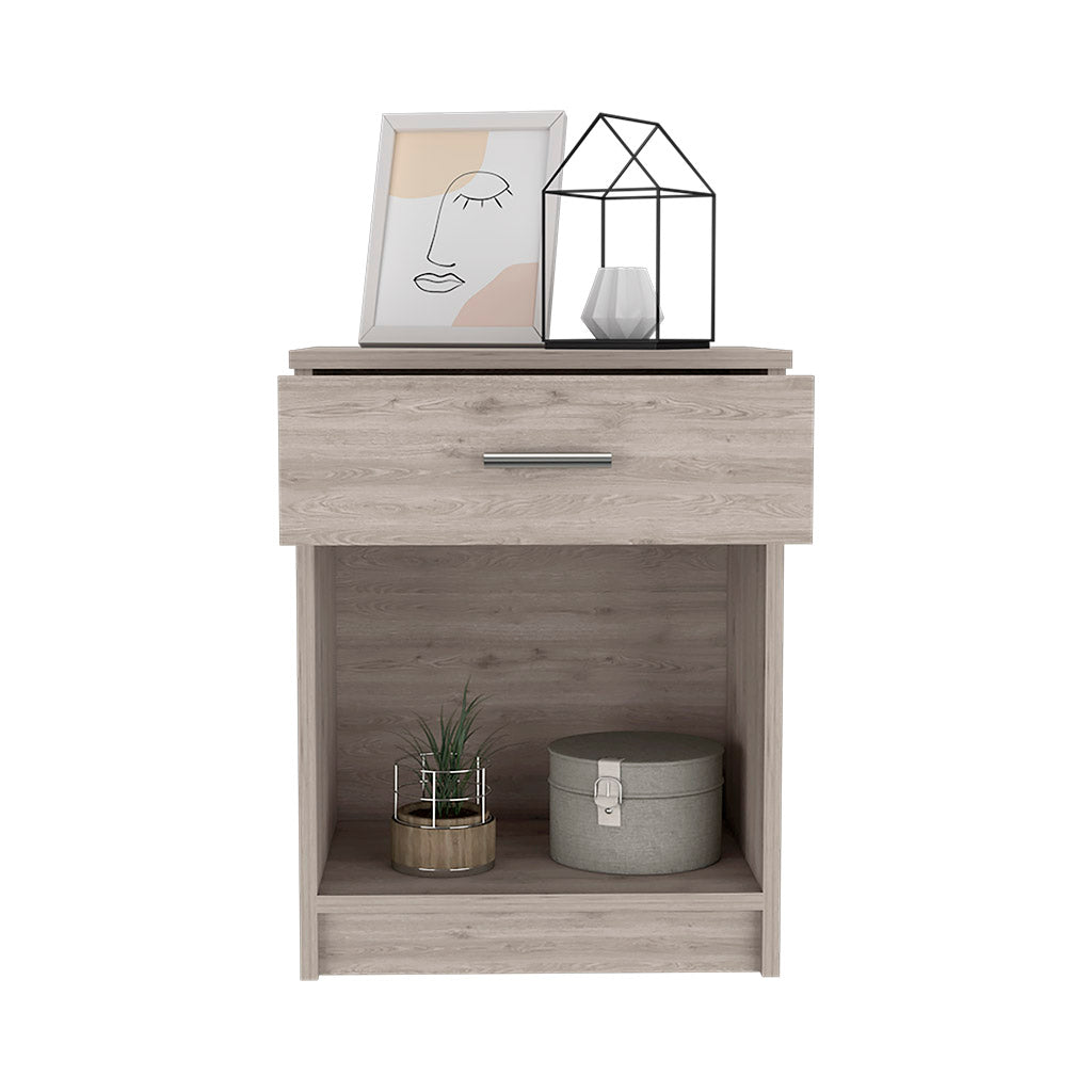 Light oak bedside table with one drawer and open shelf featuring modern decor