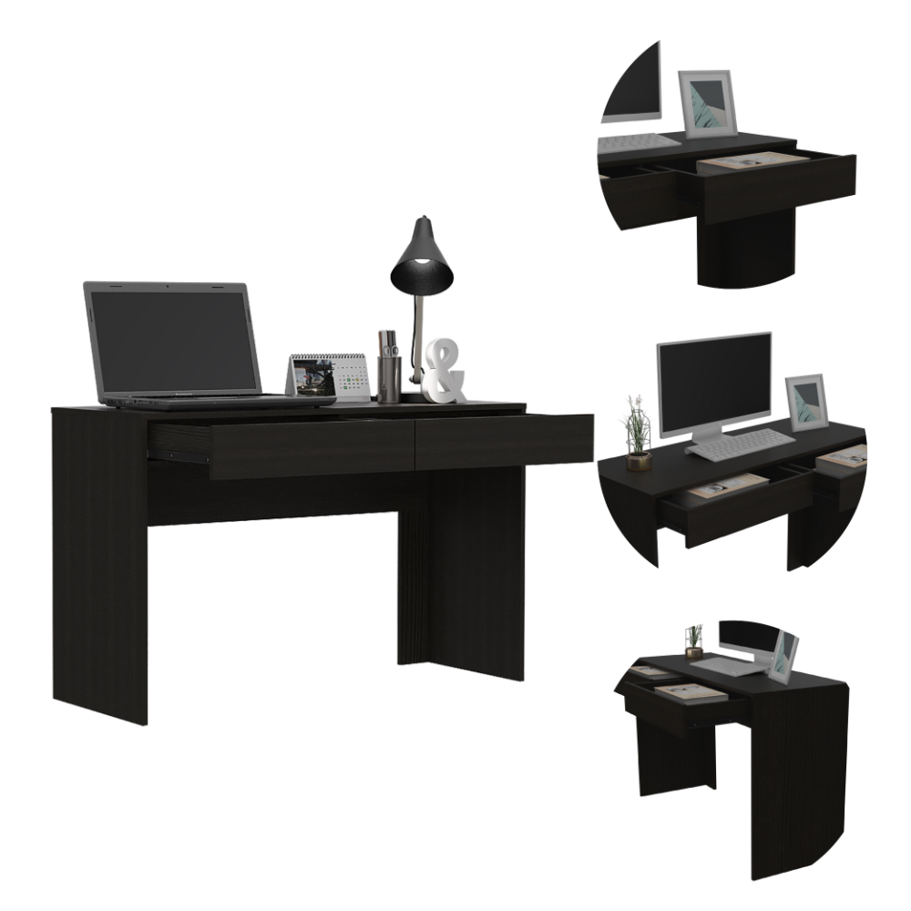 Dark wood computer desk with two drawers laptop and lamp