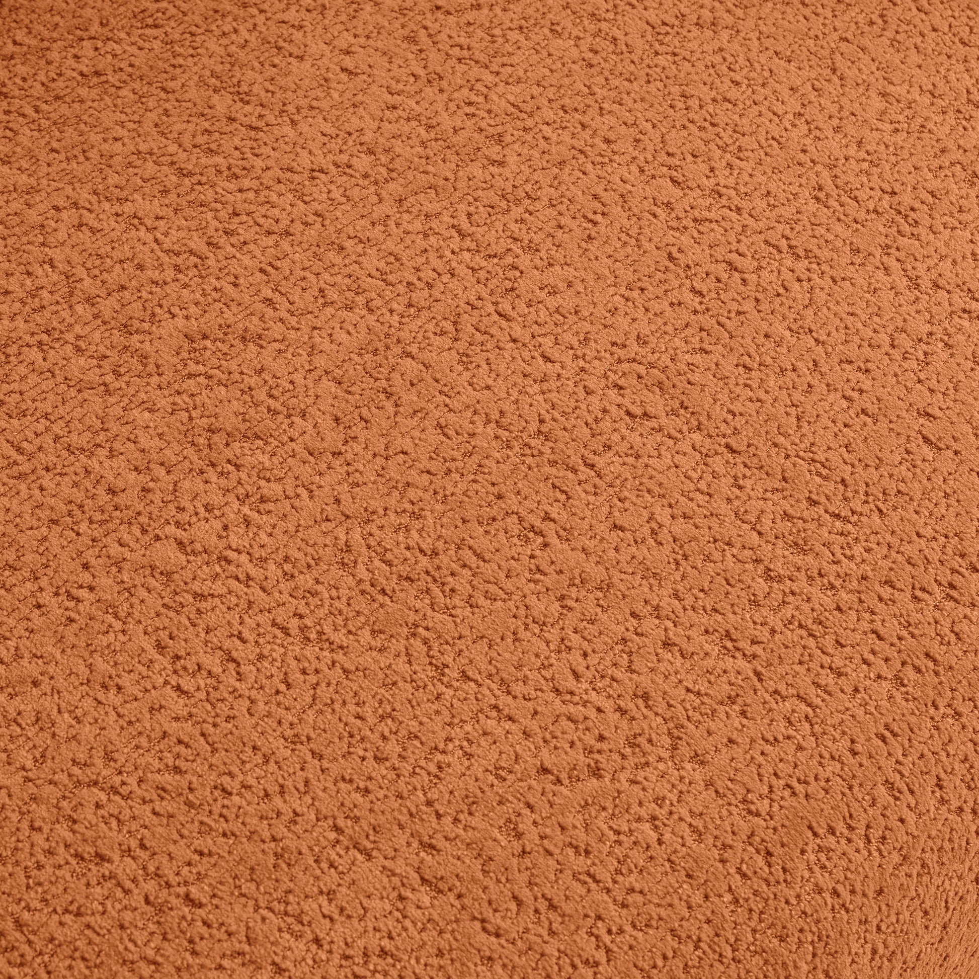 Cozy terracotta boucle fabric texture ideal for upholstery