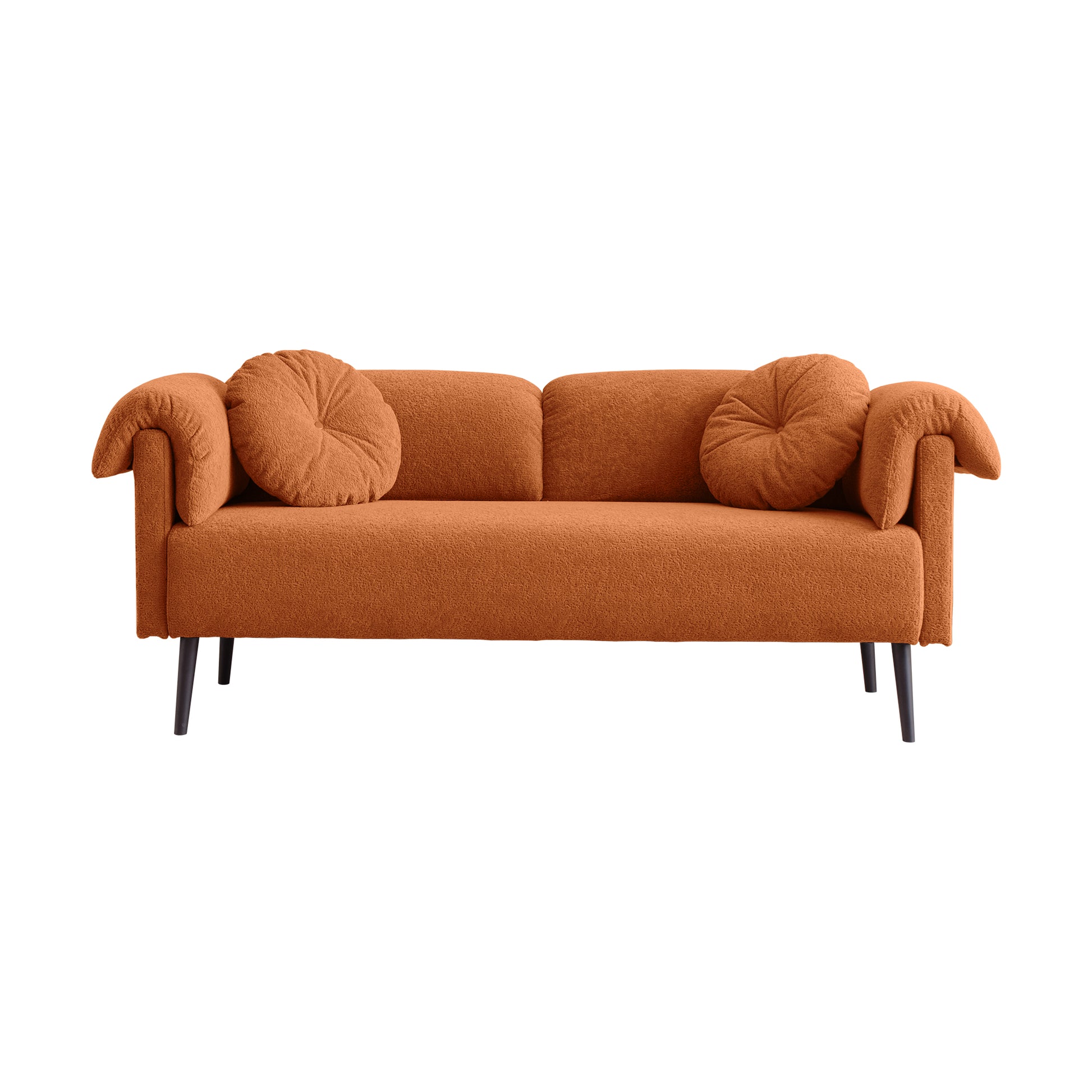 Orange boucle sofa with two round accent pillows and modern dark legs