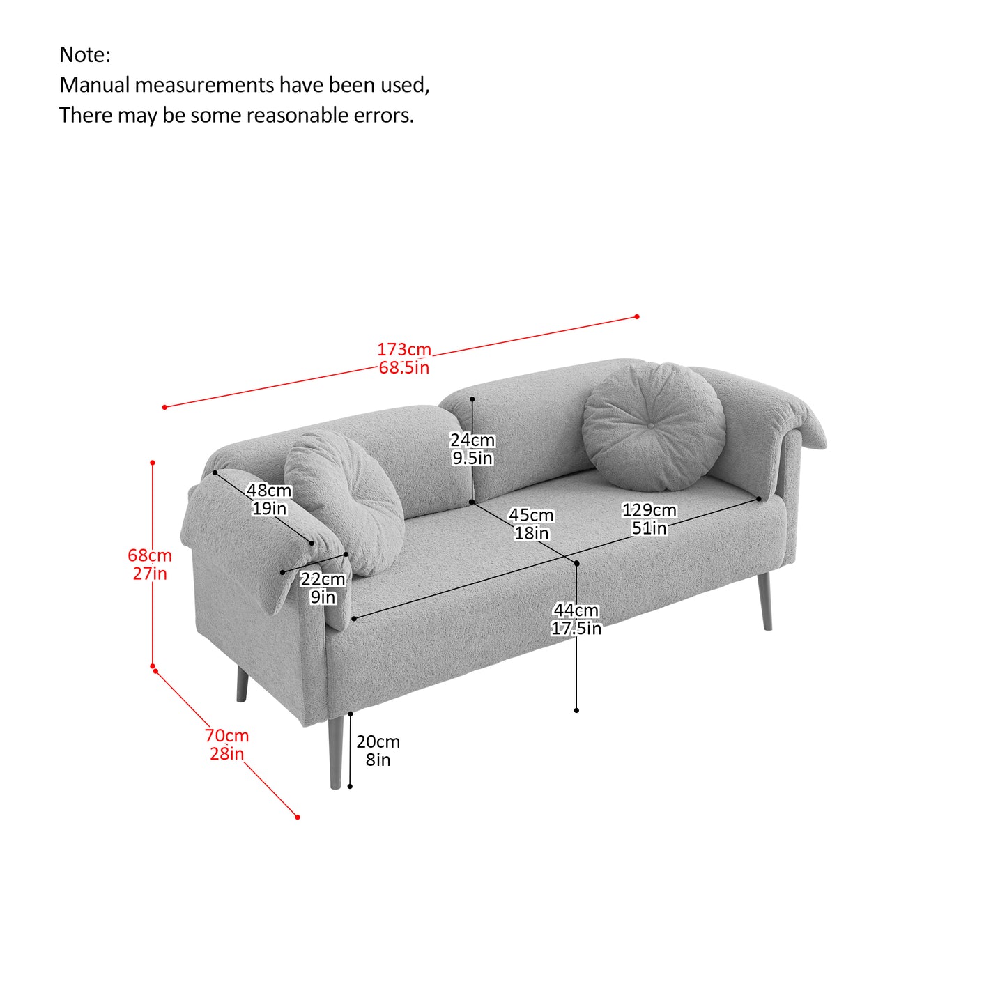 Light grey textured fabric sofa with rounded arms and two circular throw pillows