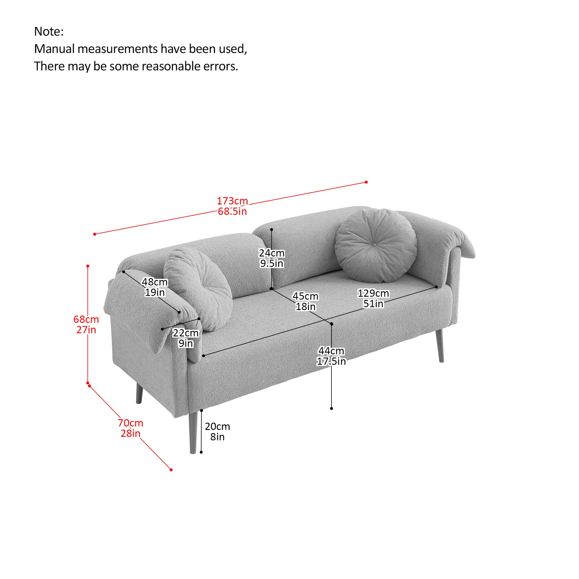 Light grey textured fabric sofa with rounded arms and two circular throw pillows
