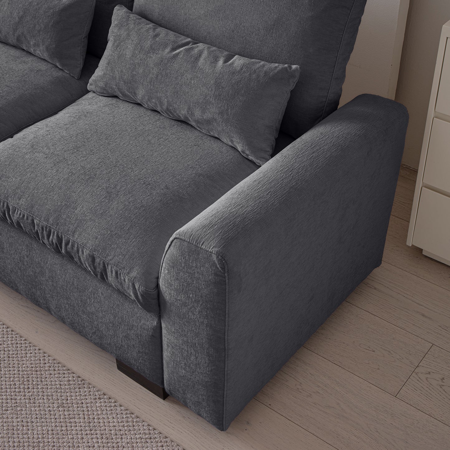 Dark grey fabric sectional sofa with plush cushions modern living room furniture