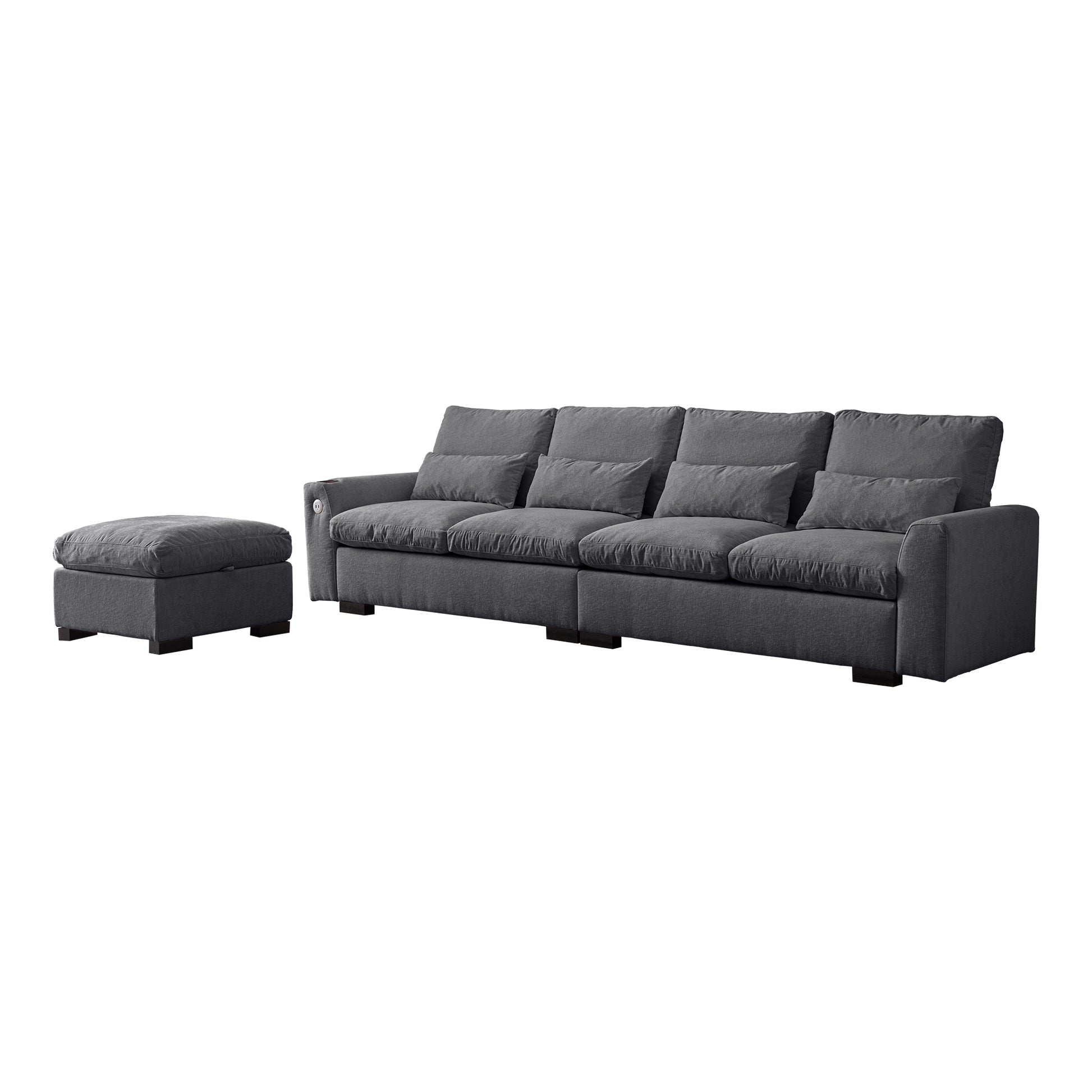 Deep charcoal grey upholstered modular sofa with plush cushions and matching ottoman