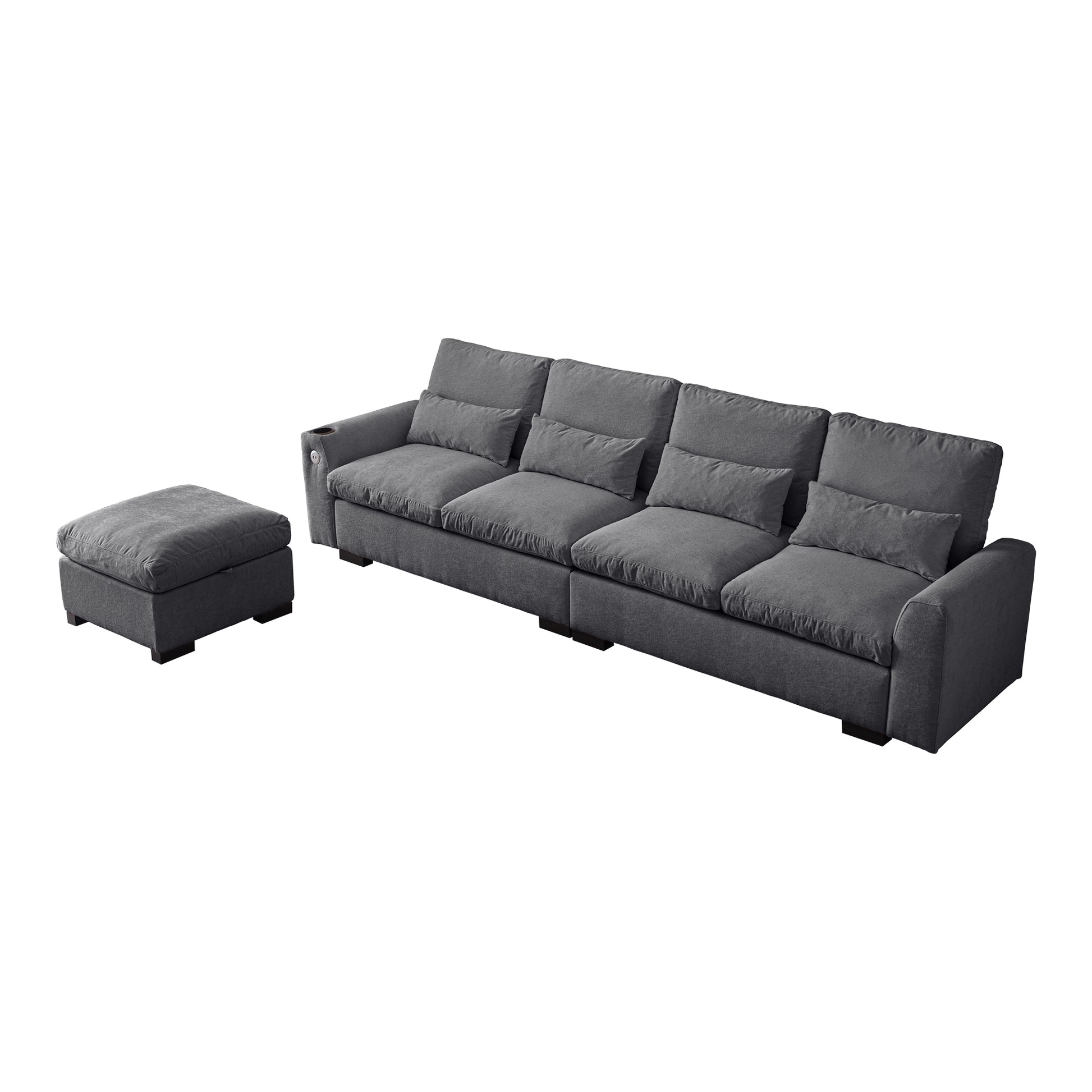 Dark gray fabric sectional sofa with plush cushions and matching ottoman