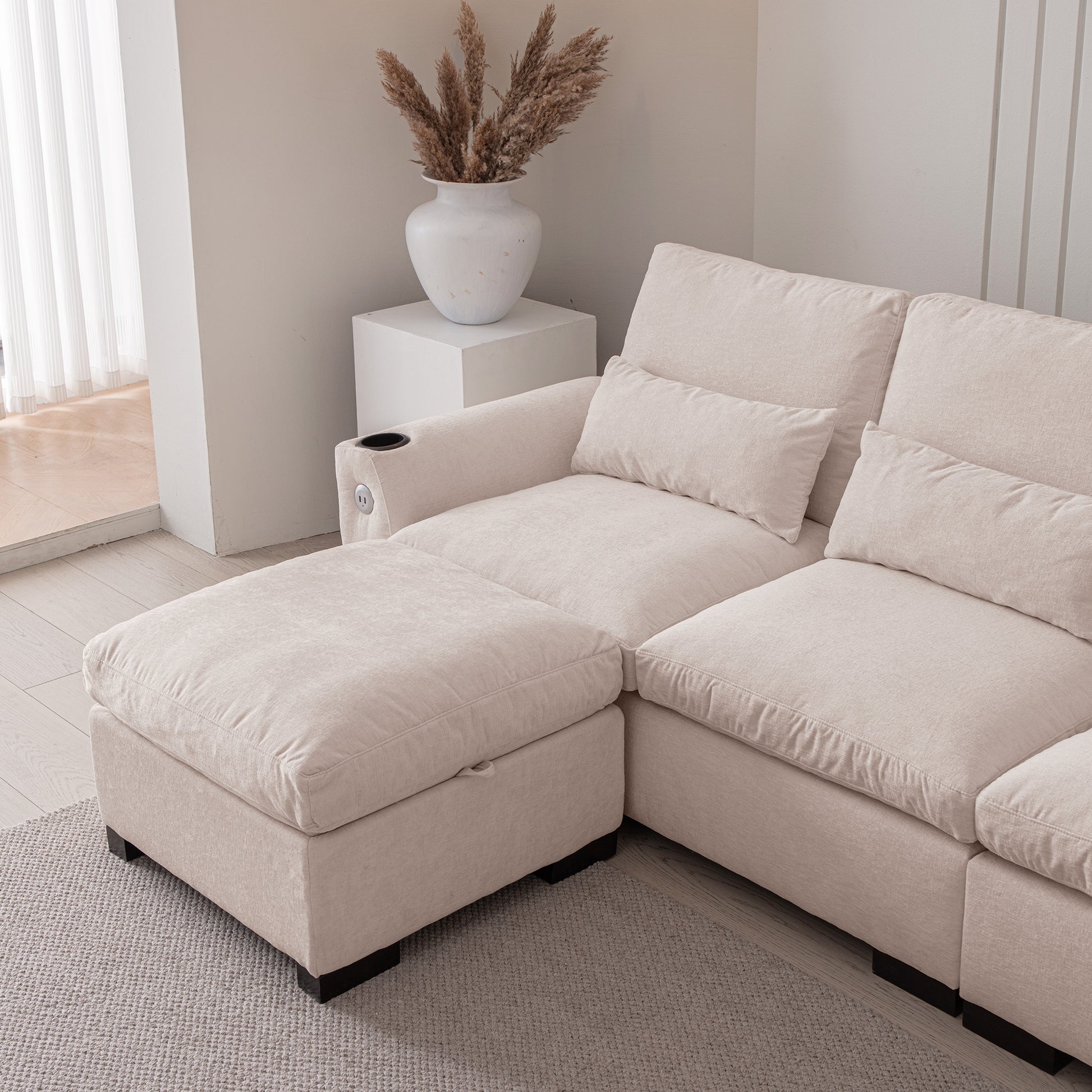 Beige linen modular sectional sofa with ottoman and builtin cup holder