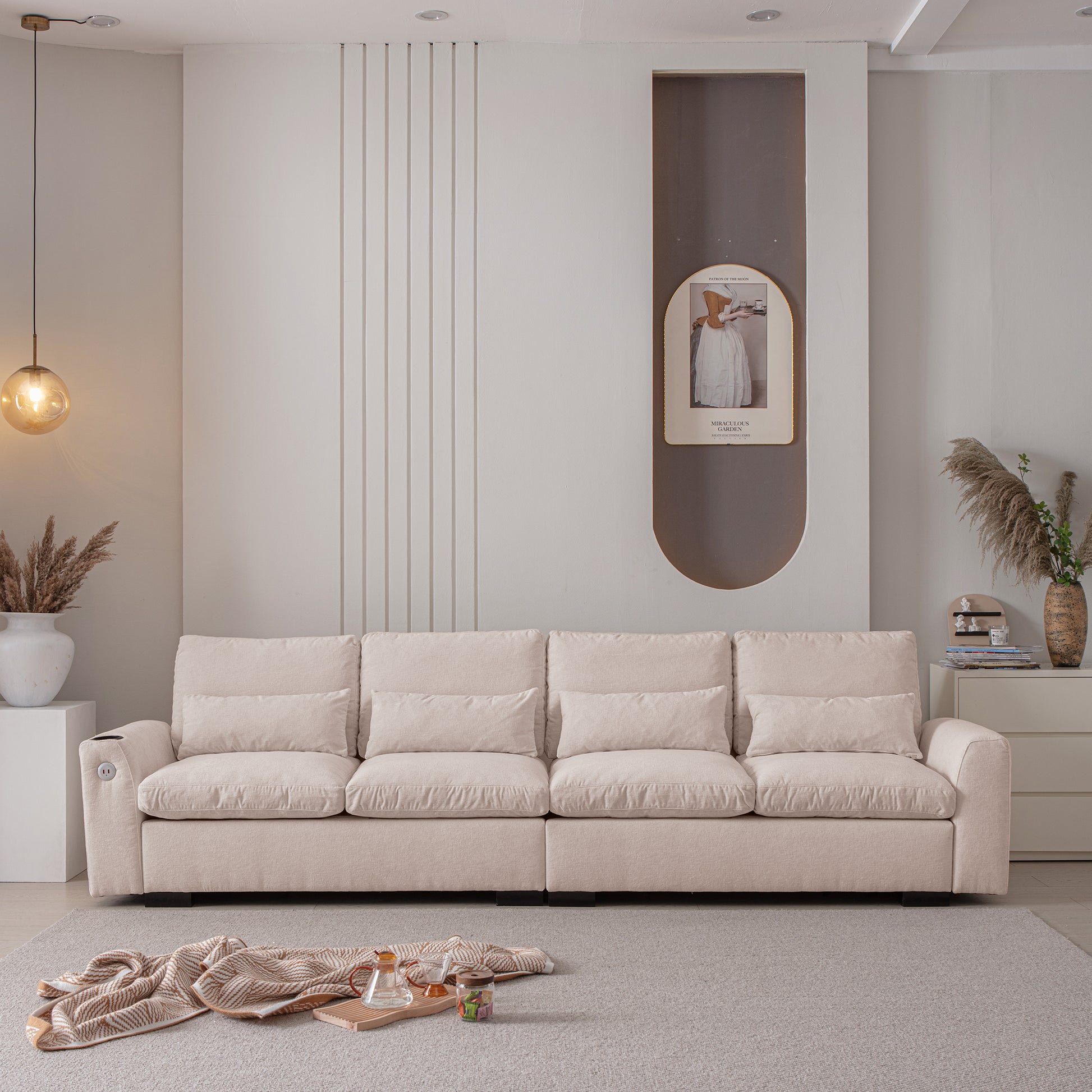 Luxurious beige sectional sofa with plush cushions and integrated charging port