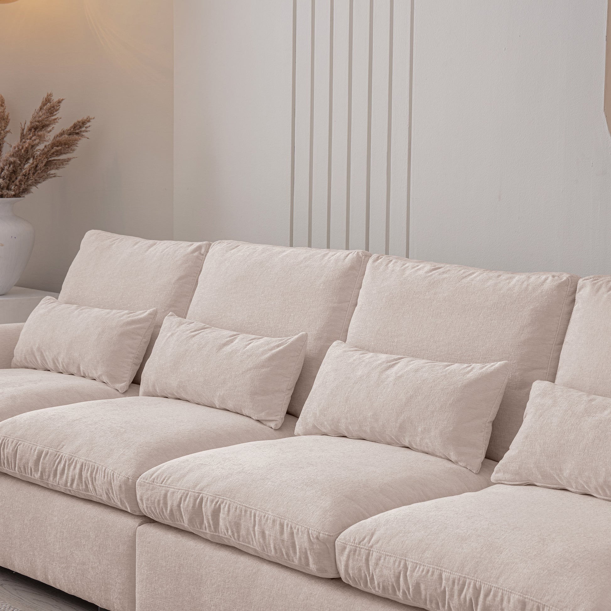 Plush beige sectional sofa with deep seating and textured linen upholstery perfect for modern living rooms