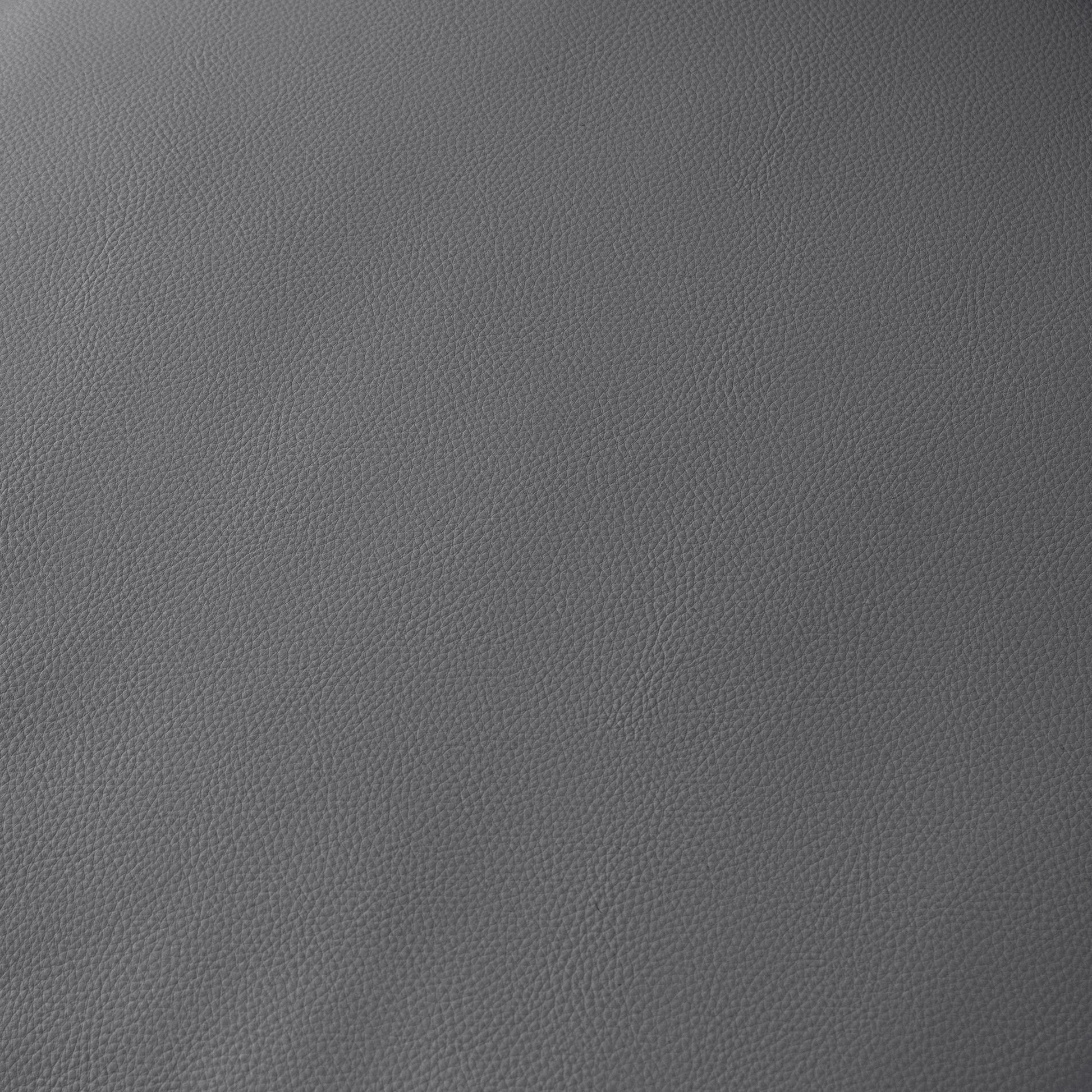 Closeup of textured grey leather material perfect for upholstery or fashion accessories