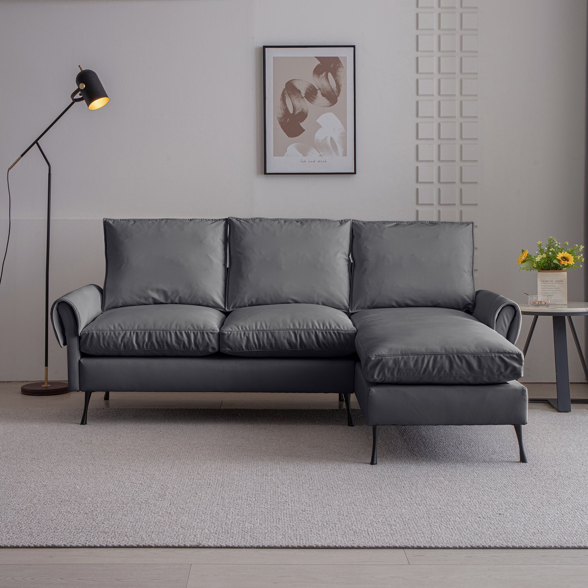Modern grey sectional sofa with clean lines and plush cushions perfect for contemporary living rooms