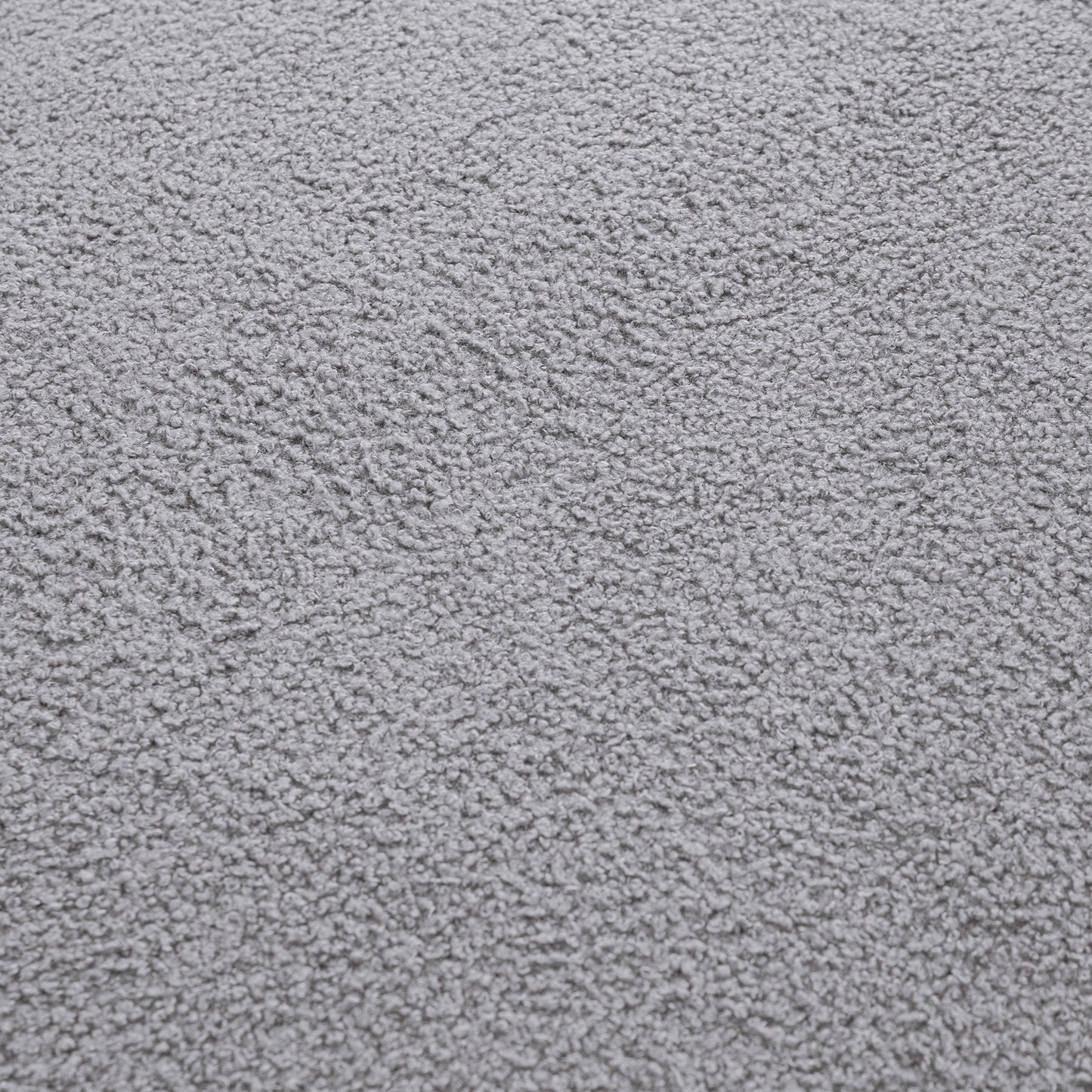 Closeup of a soft grey sherpa fabric texture ideal for blankets and upholstery