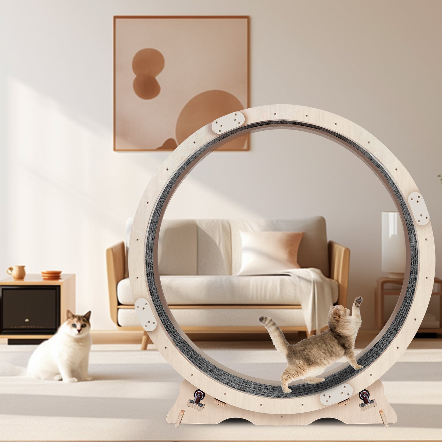Natural wood cat wheel with sisal scratch surface and two cats playing in a modern living room