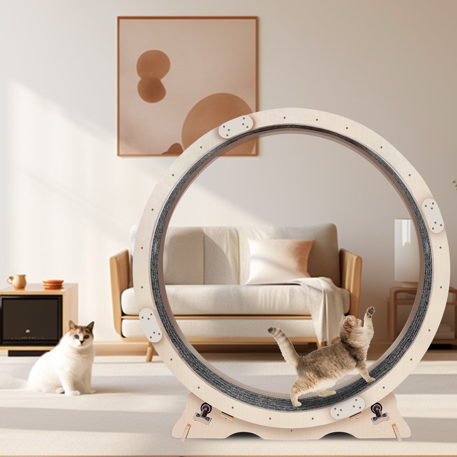 Natural wood cat wheel with sisal scratch surface and two cats playing in a modern living room