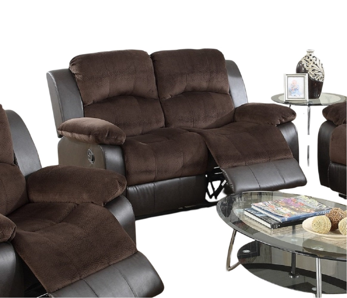 Brown reclining loveseat with faux leather and plush fabric perfect for a cozy living room