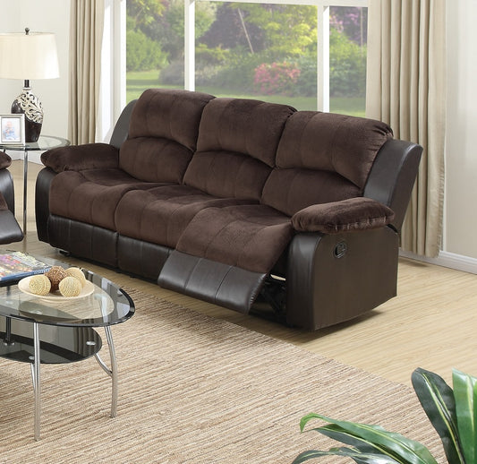 Plush brown reclining sofa with faux leather trim perfect for a comfortable living room