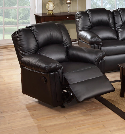 Plush black leather recliner with extended footrest for ultimate comfort