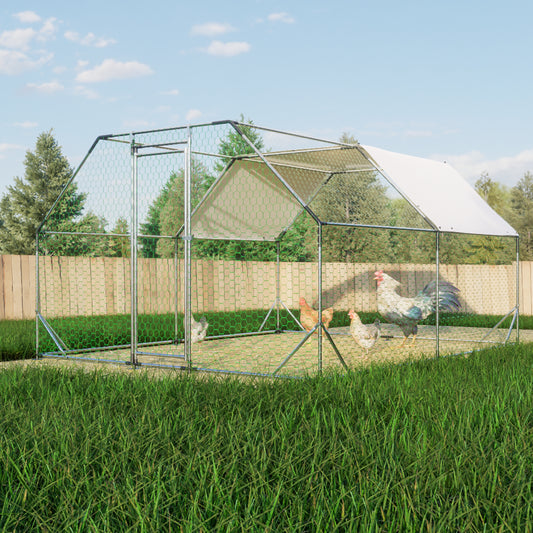 Large metal chicken coop with white roof and green mesh enclosure housing a rooster and hens outdoors