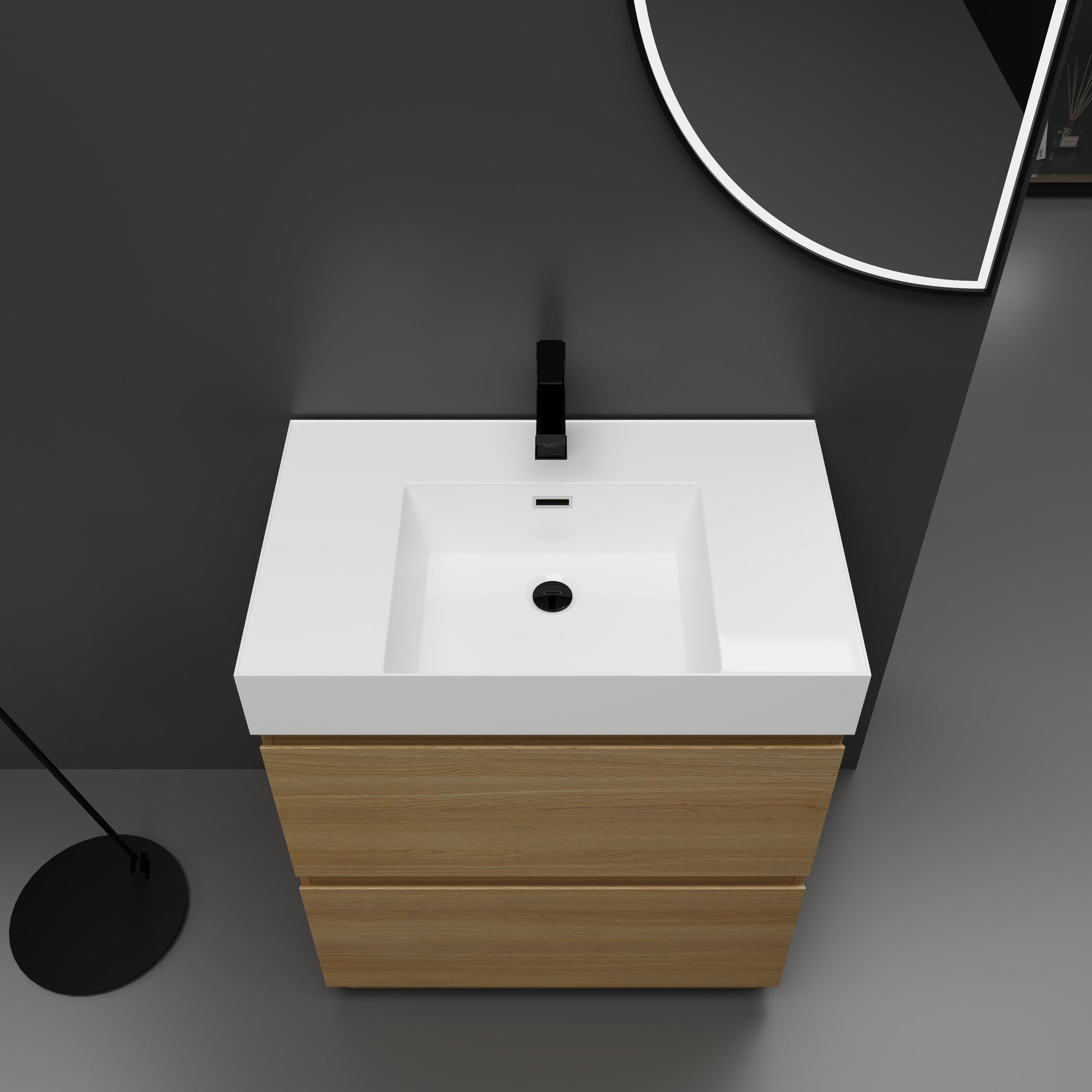 Modern oak vanity with white integrated sink and black faucet