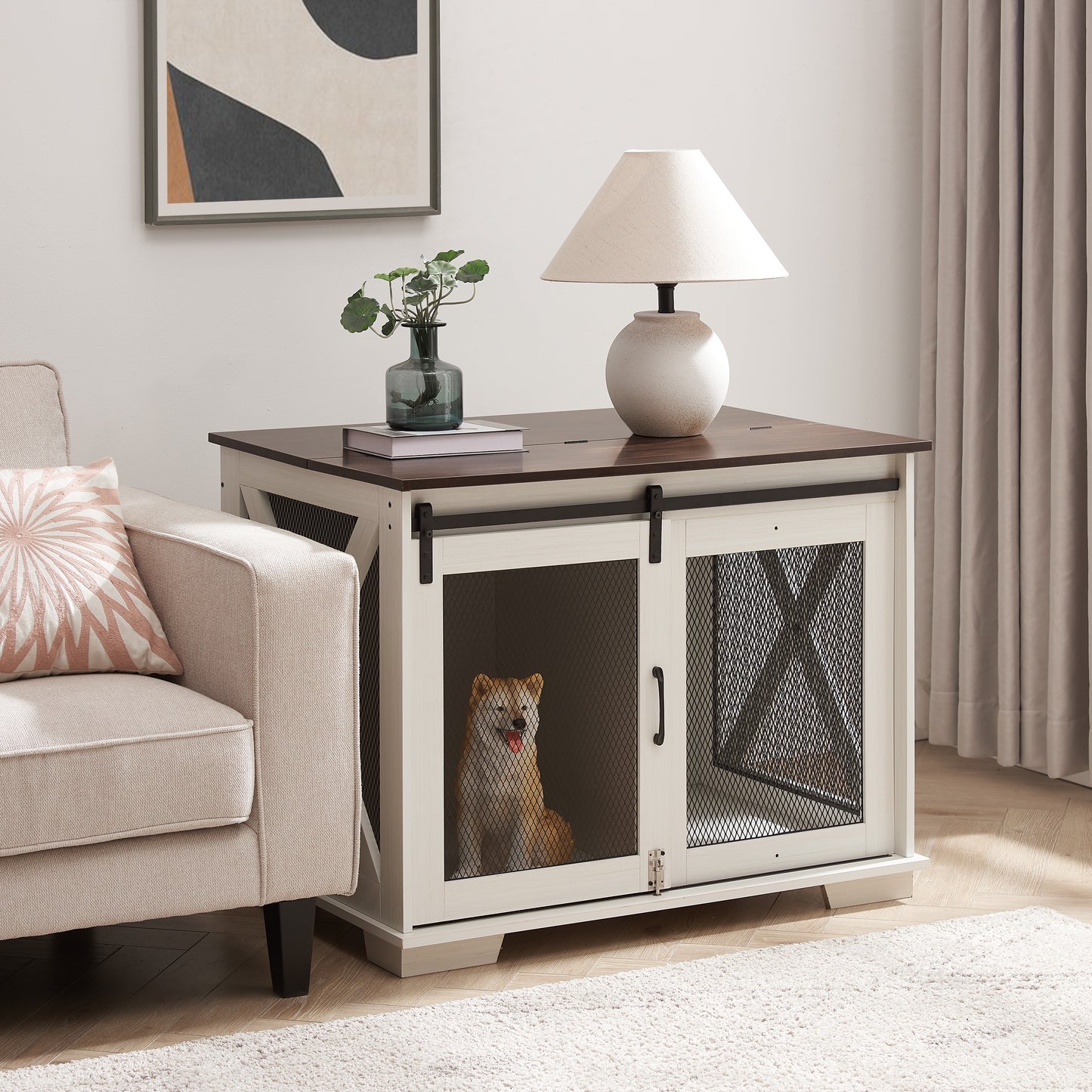 White wooden dog crate with sliding barn doors and a dark wood top housing a toy dog