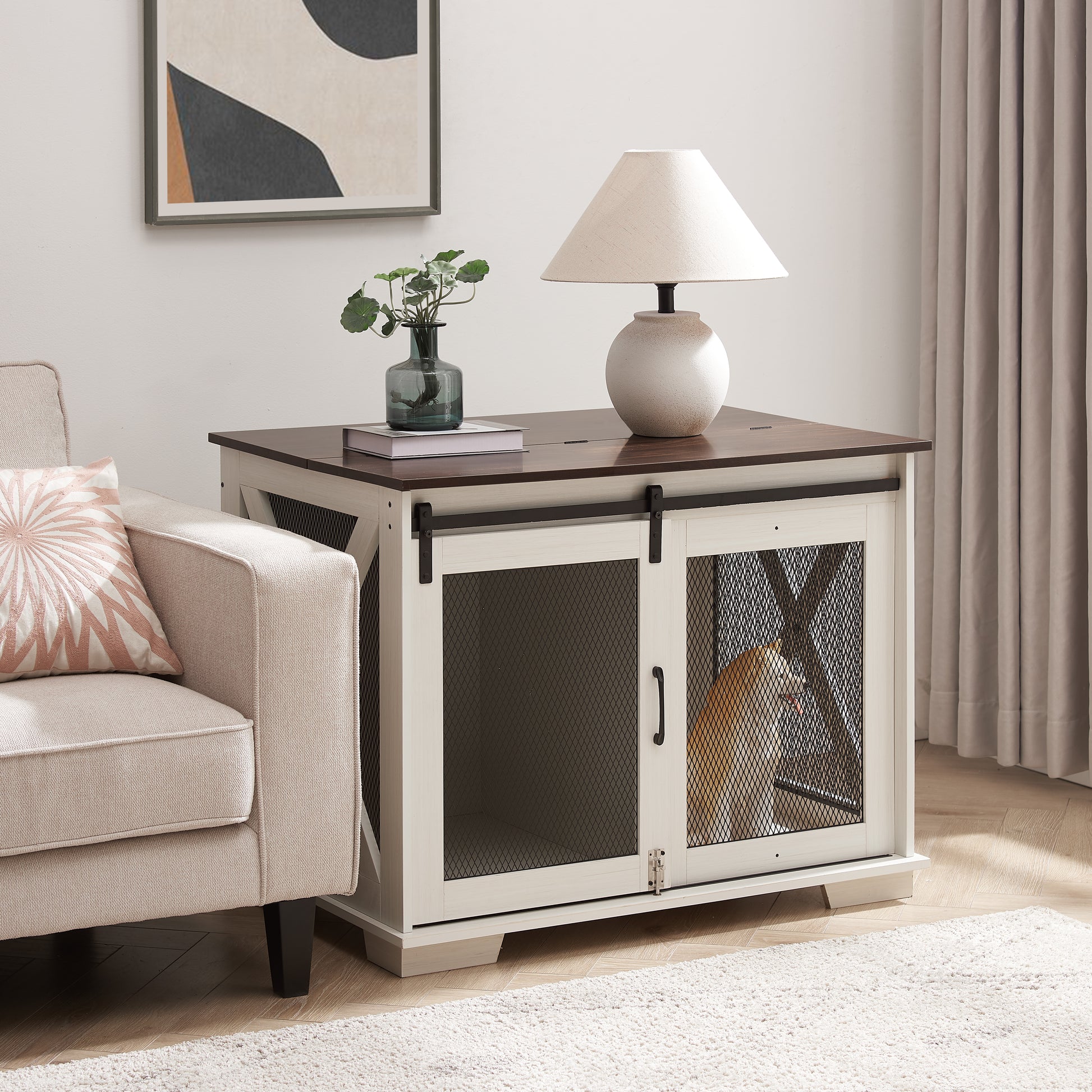 White farmhouse dog crate with sliding barn doors and a dark wood top