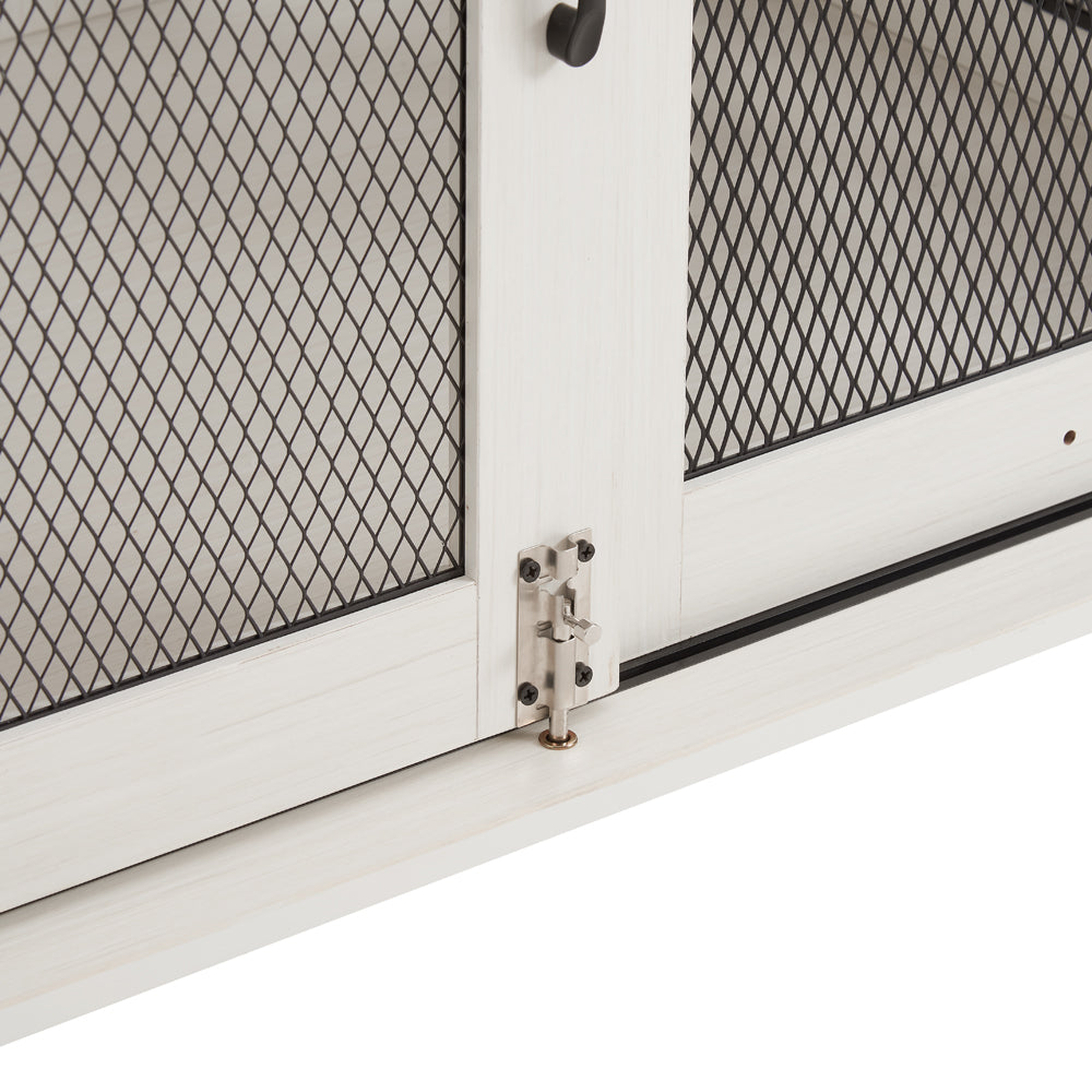 Distressed white wood cabinet with black mesh door and silver latch