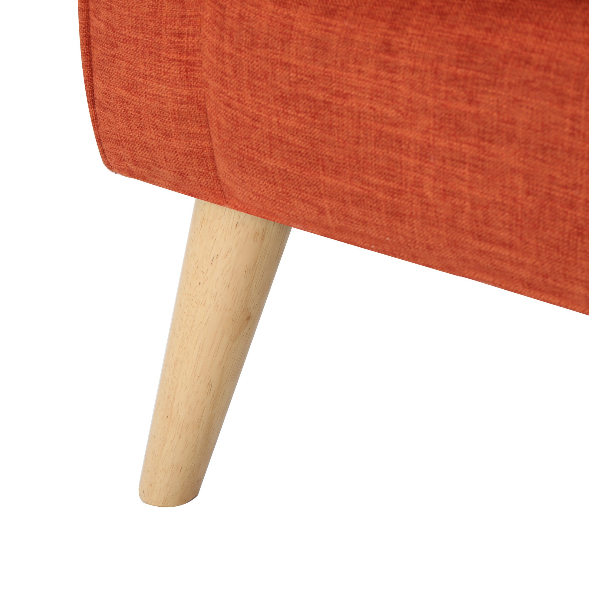 Orange textured fabric sofa detail with tapered wooden leg