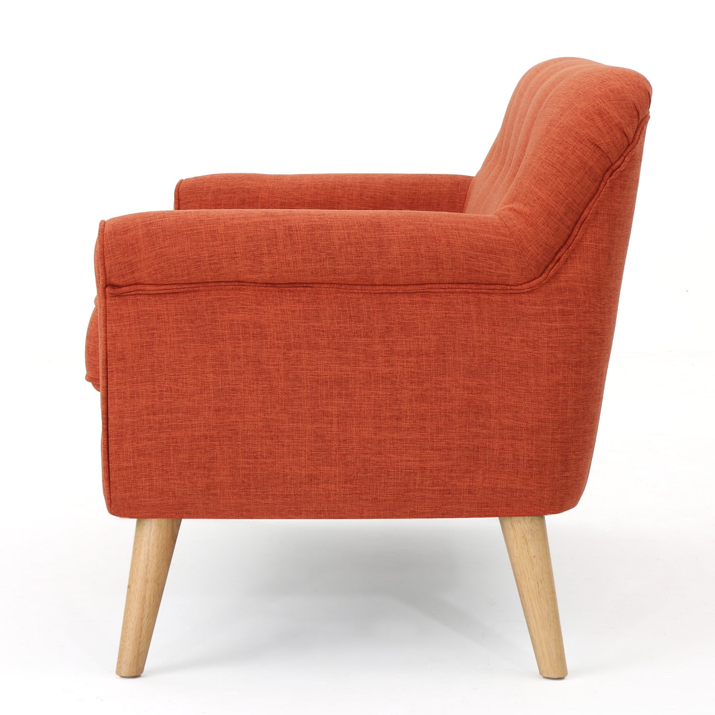 Terracotta accent chair with tufted back and tapered wooden legs modern style