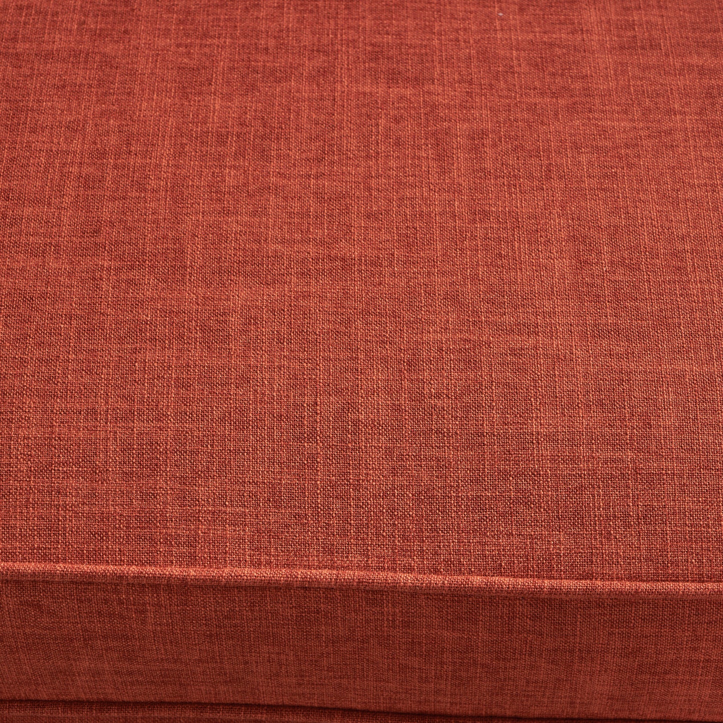 Closeup of textured terracotta linen fabric ideal for upholstery and home decor projects